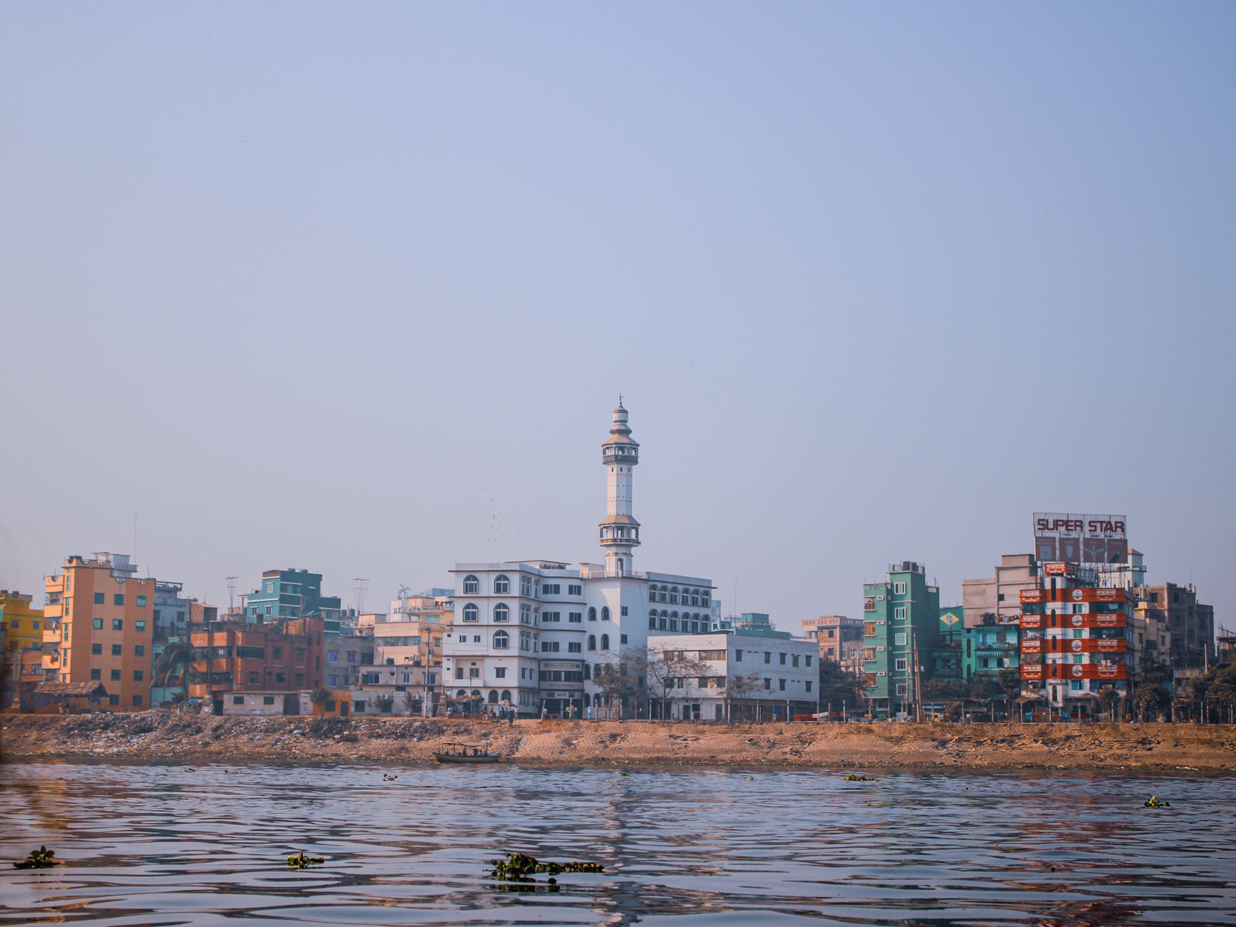 Busy river ferry and waterway in Dhaka, Bangladesh
