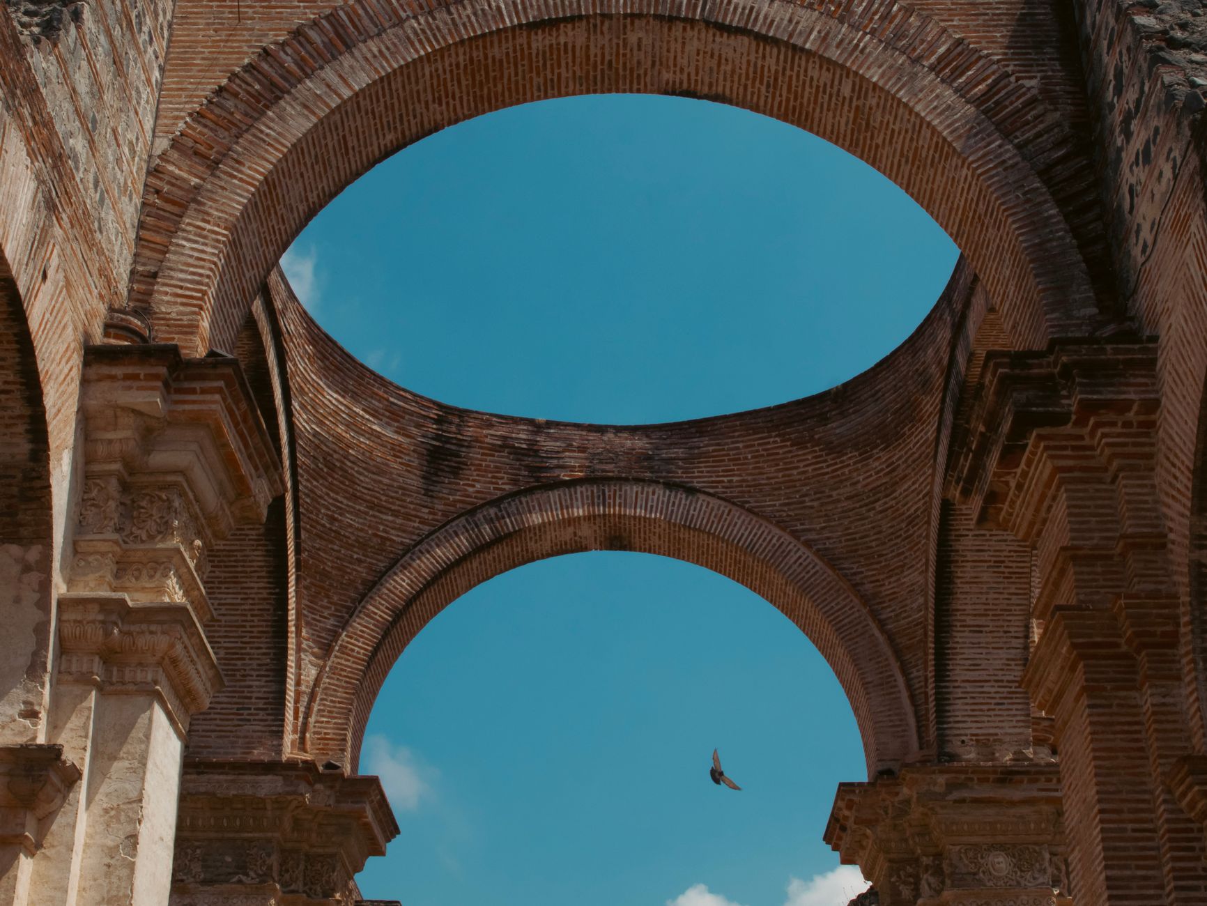Antigua colonial city with volcano backdrop and cobblestone streets, Guatemala