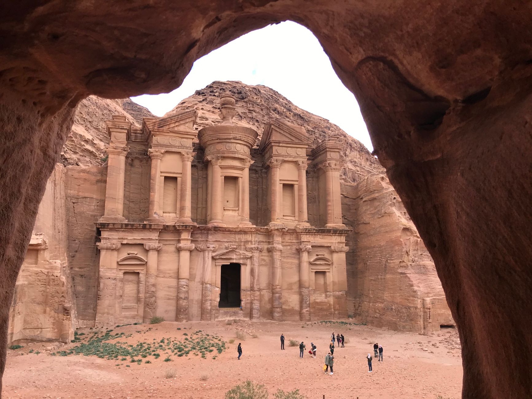 Treasury facade carved into rose-red cliffs at Petra, Jordan